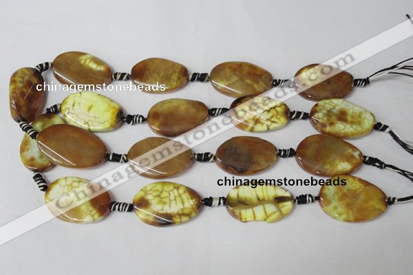 CAG1578 15.5 inches 20*30mm twisted oval fire crackle agate beads