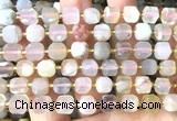 CCU1502 15 inches 8mm - 9mm faceted cube sakura agate beads