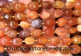 CNG9325 15 inches 10*14mm - 13*18mm nuggets red Botswana agate beads