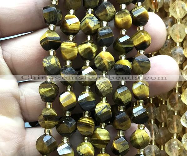 CTW565 15 inches 8mm faceted & twisted S-shaped yellow tiger eye beads