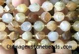 CTW660 10mm faceted & twisted S-shaped green rutilated quartz beads